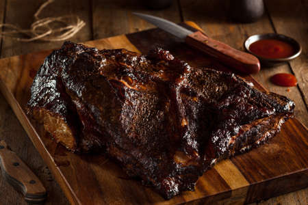 Homemade Smoked Barbecue Beef Brisket with Sauceの写真素材