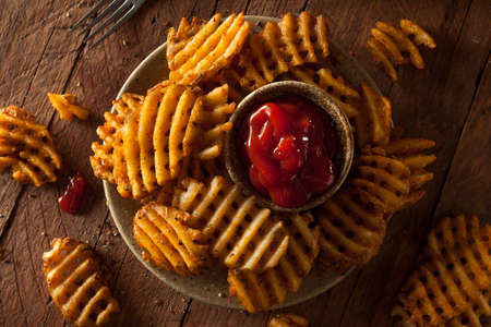Crispy Homemade Waffles Fries with Organic Ketchupの写真素材