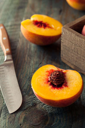 Raw Organic Yellow Peaches Ready to Eatの写真素材