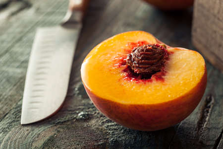 Raw Organic Yellow Peaches Ready to Eatの写真素材