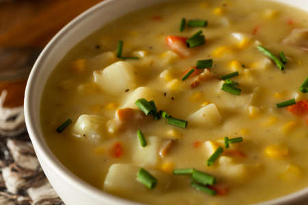 Hot Homemade Corn Chowder in a Bowlの写真素材
