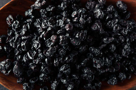Healthy Raw Dried Blueberries in a Bowlの写真素材