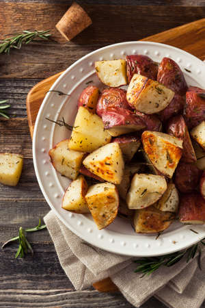 Homemade Roasted Herb Red Potatoes with Salt and Pepperの写真素材