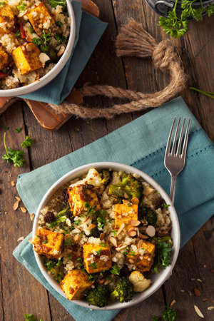 Homemade Quinoa Tofu Bowl with Roasted Veggies and Herbsの写真素材