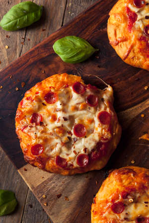 Homemade Cheesy Pepperoni PIzza on a Biscuit with Sauceの写真素材