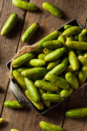 Raw Green Organic Tindora in a Basketの写真素材