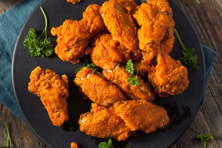 Spicy Deep Fried Breaded Chicken Wings with Ranchの写真素材