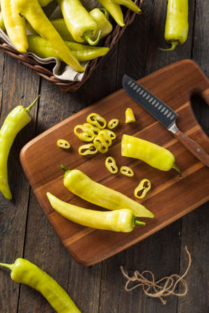 Raw Organic Yellow Banana Peppers Ready to Cutの写真素材