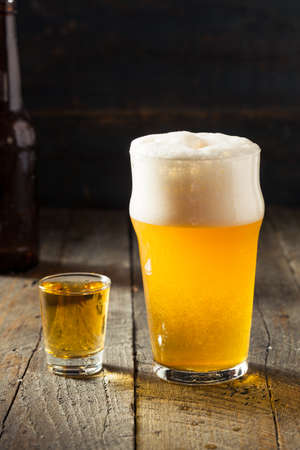 Refreshing Beer and Whiskey Shot Boilermaker Cocktail Drinkの写真素材