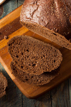 Homemade Organic Pumpernickel Rye Bread Cut into Slices