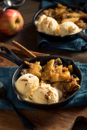 Homemade Sauteed Cinnamon Sugar Apples with Ice Creamの写真素材