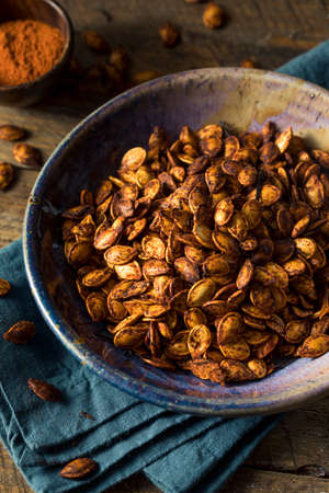 Homemade Roasted Spicy Pumpkin Seeds with Chili and Paprikaの写真素材