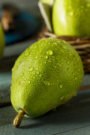 Raw Green Organic Danjou Pears Ready to Eatの写真素材
