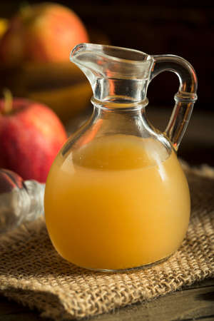 Raw Organic Apple Cider Vinegar in a Bottleの写真素材