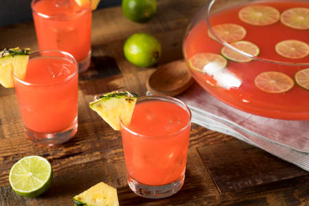 Homemade Jamaican Rum Punch with Lime and Pineappleの写真素材