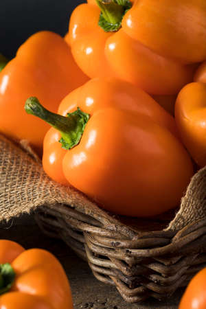 Raw Organic Orange Bell Pepper Ready for Cooking