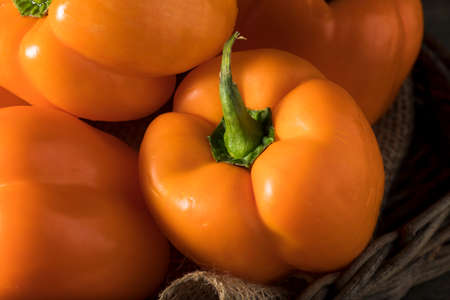 Raw Organic Orange Bell Pepper Ready for Cooking
