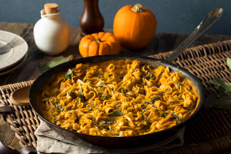 Homemade Autumn Pasta with Pumpkin Sauce and Sageの写真素材