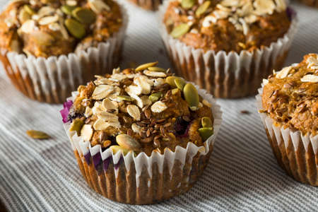 Healthy Organic Seed and Blueberry Muffins with Banana and Whole Grainの写真素材