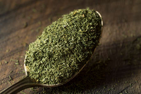 Raw Green Organic Dry Dill Weed in a Bowlの写真素材