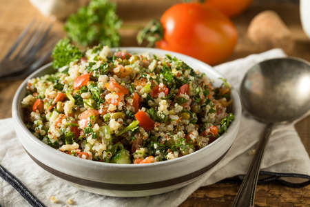 Healthy Organic Quinoa Tabouli Salad with Tomato and Cucumberの写真素材