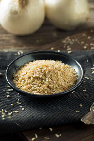Raw Organic White MInced Dry Onion in a Bowlの写真素材