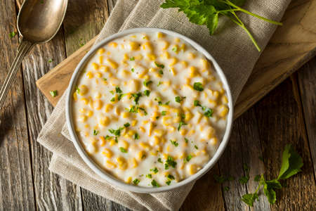 Fresh Homemade Creamed Corn in a Bowlの写真素材