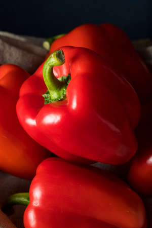 Raw Organic Red Bell Peppers Ready to Eatの写真素材