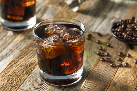 Alcoholic Boozy Black Russian Cocktail with Vodka and Coffee Liquorの写真素材