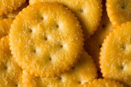 Round Salty Yellow Crackers Ready to Eatの写真素材