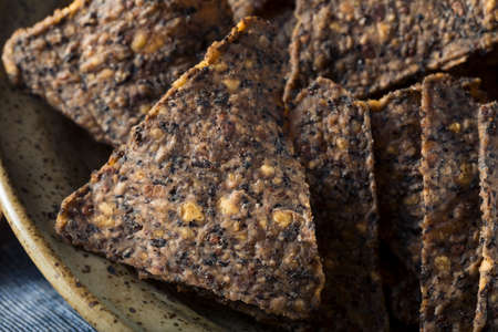 Homemade Salty Black Bean Tortilla Chips in a Bowlの写真素材