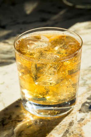 Refreshing Alcoholic Scotch and Soda Cocktail with Iceの写真素材