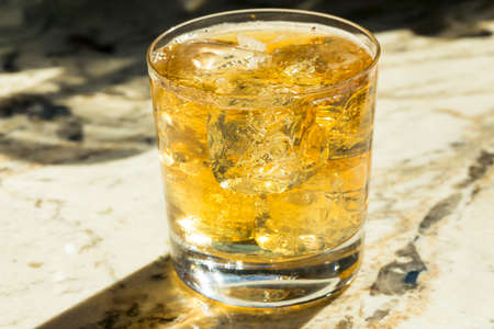 Refreshing Alcoholic Scotch and Soda Cocktail with Ice