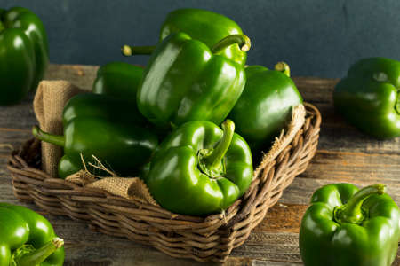 Raw Green Organic Bell Peppers Ready to Cook Withの写真素材