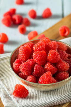 Raw Organic Red Raspberries in a Bowl
