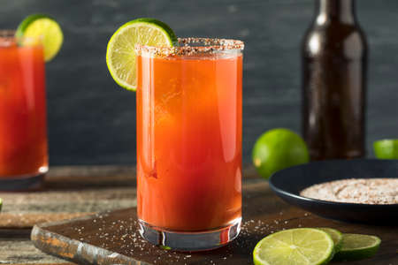 Homemade Michelada with Beer Salted Rim and Tomato Juiceの写真素材