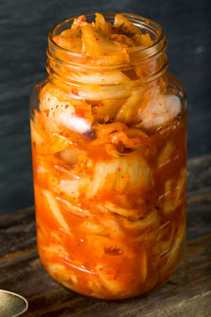 Homemade Spicy Fermented Korean Kimchi in a Bowlの写真素材