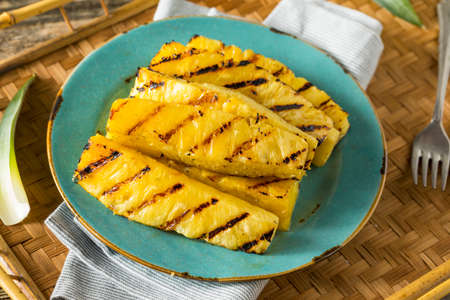 Sweet Grilled Pineapple Slices Ready to Eatの写真素材