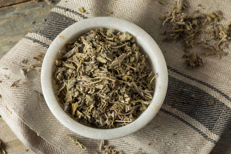 Organic Dry Green Sage in a Bowlの写真素材