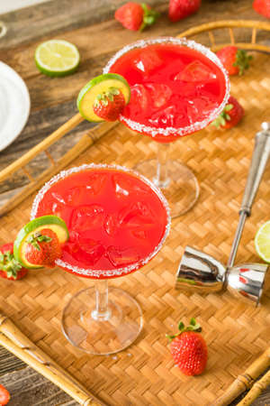 Homemade Iced Starwberry Margarita with Limes for Garnishの写真素材