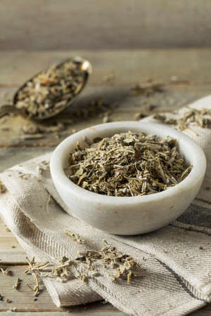 Organic Dry Green Sage in a Bowlの写真素材