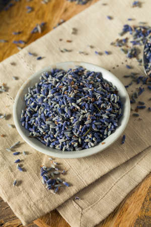 Raw Organic Dry Purple Lavender Spice in a Bowlの写真素材