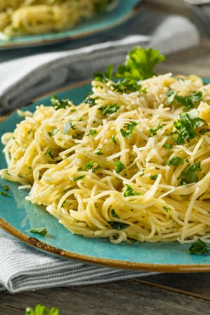 Garlic and Parsley Agnel Hair Pasta with Cheeseの写真素材