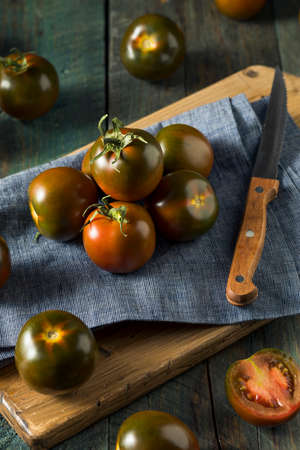 Raw Organic Brown Kumato Tomatoes Ready to Eatの写真素材