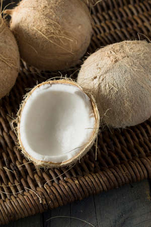 Raw Organic White Hairy Coconuts Cracked Open