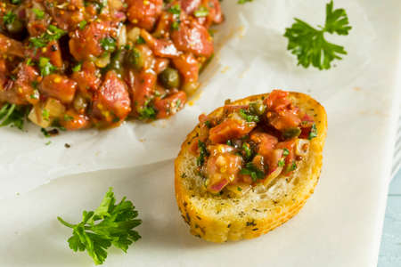 Raw Organic French Beef Tartare with Bread Slicesの写真素材