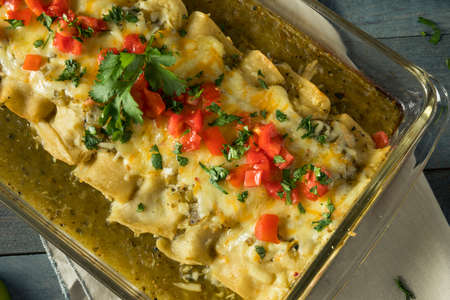 Homemade Green Chicken Enchiladas with Cilantro and Sauce
