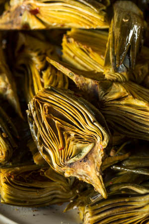 Roasted Organic Baby Artichokes with Lemon and Olive Oilの写真素材