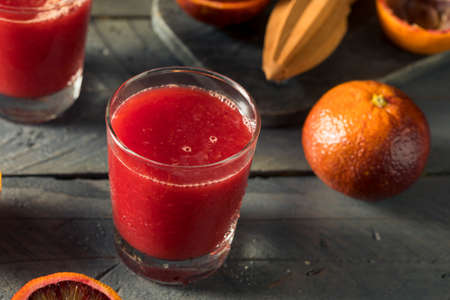 Raw Fresh Squeezed Blood Orange Juice Ready to Drinkの写真素材