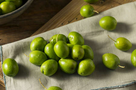 Raw Green Organic Fresh Olives Ready to Cookの写真素材